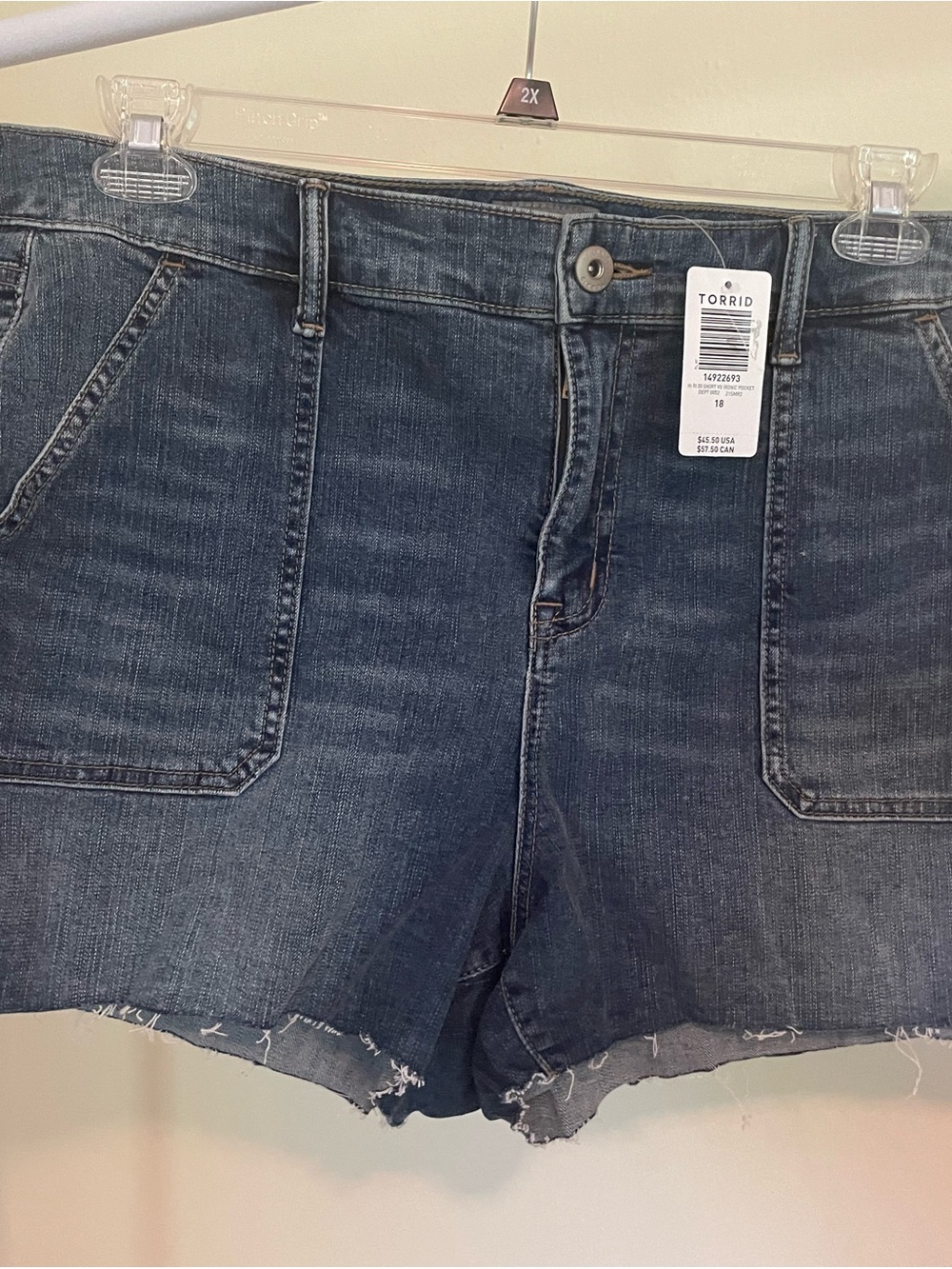 NWT denim shorts with frayed hem. Size 18.
